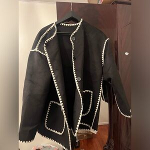 Women’s Commense jacket oversized whipstitch. Black and white